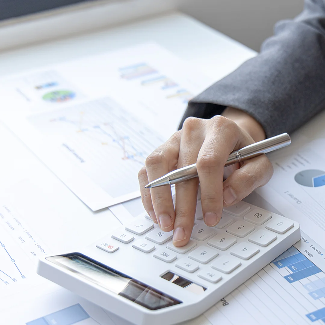 Accountant using a calculator